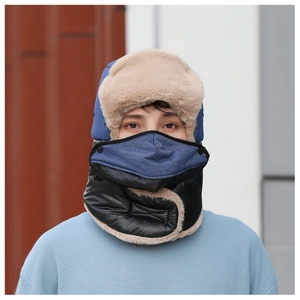 Close-up of winter trapper hat with thick fleece lining and detachable face mask cover