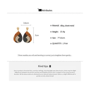 Detailed size chart for teardrop earrings showing 7cm height and 3.6cm width dimensions