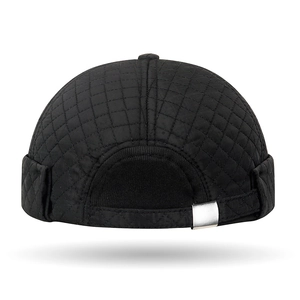 Men's black quilted docker hat with diamond stitch pattern and metal buckle closure