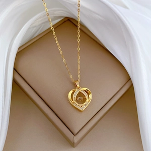Elegant gold titanium steel heart necklace with dancing zircon and sparkling crystals