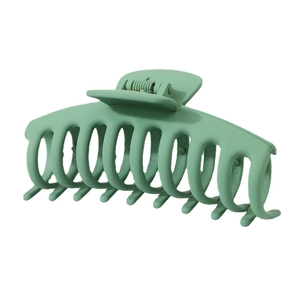 Matte mint green 11cm large hair claw clip with a strong metal spring on white background
