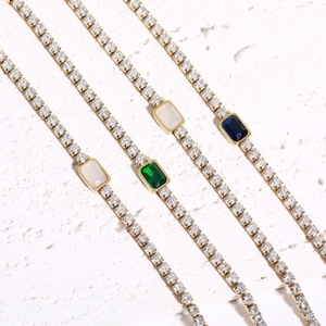 Tennis choker necklace with emerald-style stones and 18K gold plated stainless steel