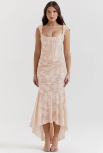 Detail of champagne strapless fishtail dress with textured floral jacquard fabric