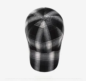 Top view of plaid baseball cap with BAHCK embroidery and six-panel design detail