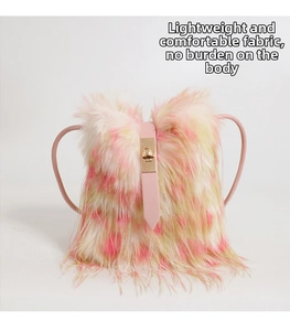 Close-up of fluffy colorful faux fur texture with pink leather strap and gold metal lock