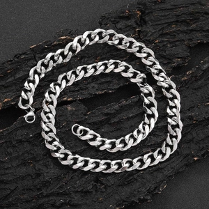 11mm silver stainless steel Cuban link necklace for men with lobster clasp on bark texture