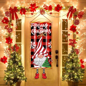 Black and red plaid Christmas gnome door curtain hanging on a wooden door with lights