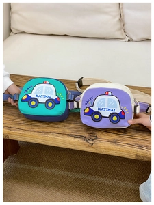 Detail showing cartoon police car print and durable canvas fabric on children waist bags