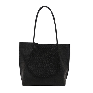 Retro black woven leather tote bag with dual shoulder straps for casual commuting