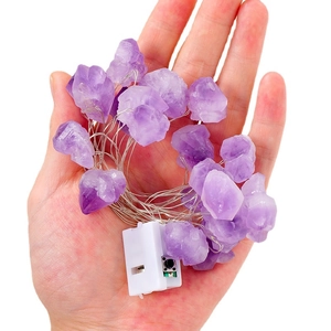 Handheld natural purple crystal stone string lights with a white battery box