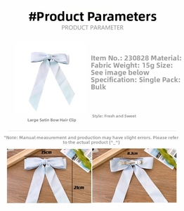 Detail of light blue satin bow hair clip with size measurements and metal spring clip