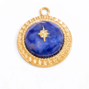 Bohemian gold star pendant with blue natural stone inlay on a white background
