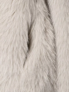 Close-up of light gray faux fur texture showing soft plush density and fiber detail