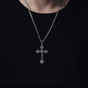 Minimalist 925 sterling silver cross pendant necklace worn by a model on a black shirt