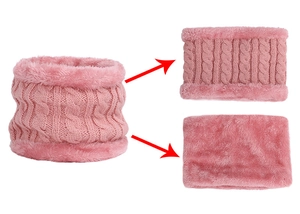 Detail of pink knitted scarf with thick faux fleece lining and cable knit texture