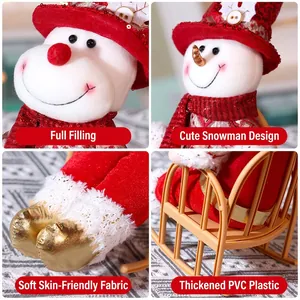 Christmas snowman doll with red sequin hat and plaid scarf on a rocking chair