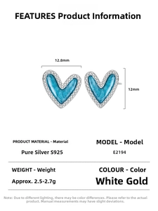Detail view of 925 silver heart stud earrings with blue enamel and zircon inlay