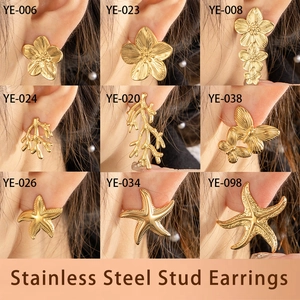 Golden stainless steel stud earrings set featuring nature themes like flowers and starfish