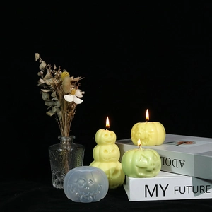 Funny pumpkin face silicone mold and handcrafted candles for Halloween DIY decor