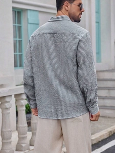 Detailed back view of a men's long sleeve shirt with black and white striped texture