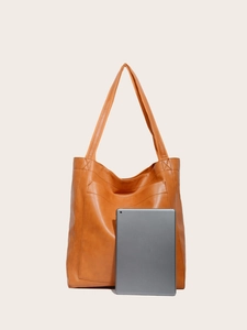 Grand sac cabas vintage en cuir orange-brun avec une tablette pour référence de taille