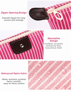 Detail of rose red striped cosmetic bag showing waterproof nylon fabric and leather accent