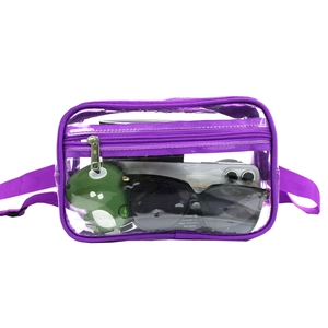 Detail of transparent PVC waist bag with purple trim showing storage capacity for sunglasses