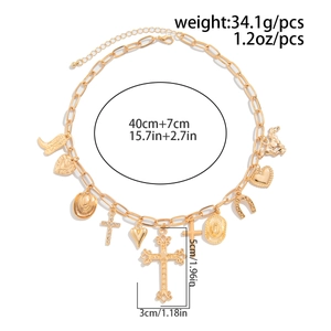 Detailed specs of gold charm necklace with cross heart boot and horseshoe pendants