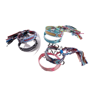 Handmade bohemian friendship bracelets set with colorful tribal geometric patterns and tassels