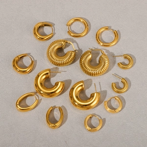 Various textured gold hoop earrings in assorted sizes with polished finish