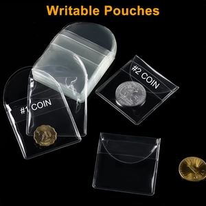 Writable transparent PVC coin sleeves in two sizes with flap protection on black background