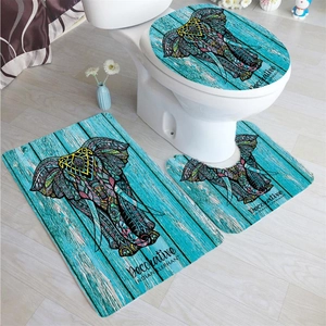 Bathroom set featuring mandala elephant print on vintage wood texture bath mats