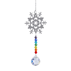 Detail of silver snowflake metal ornament with colorful beads and a faceted crystal ball