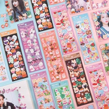 Close-up of decorative cream-style stickers with English typography and DIY motifs