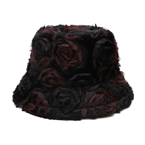 Thick plush bucket hat with 3D rose pattern in black and brown faux fur texture