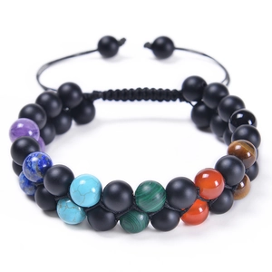 Detail of double-layer natural stone bracelet with 8mm lava rock and colorful beads
