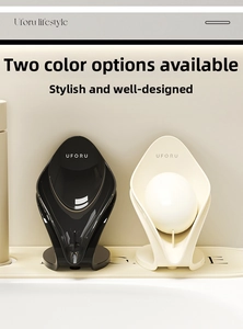 Detail view of UFORU self-draining leaf-shaped soap holder in black and beige finishes
