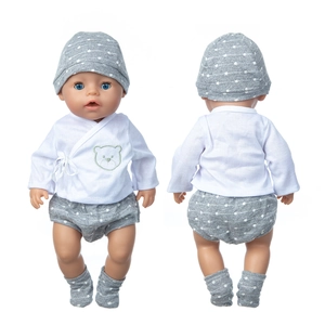 Front and back view of 18 inch doll outfit with bear pattern top and polka dot shorts