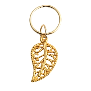 Detailed view of a gold hollow leaf metal pendant for DIY dreadlock hair jewelry accessories