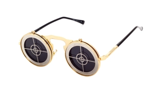 Detail of metal steam punk flip-up sunglasses featuring a target crosshair pattern