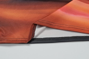 Detail of the high-quality double-needle hem stitching and sunset gradient fabric print