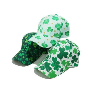 St. Patrick's Day baseball caps featuring green shamrock prints and gold glitter dots