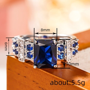 Luxurious square blue gemstone ring in silver finish with micro-paved side zircons