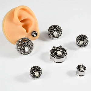 Gothic spider ear gauges in stainless steel with white shell inlay and multiple sizes