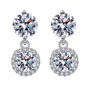 Detailed close-up of double-layer silver halo earrings with round-cut cubic zirconia