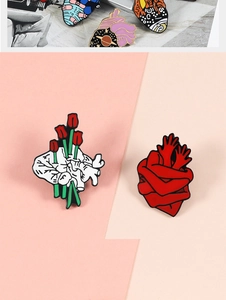 Artistic enamel heart brooch set with red tulips and embracing hands on enamel pins