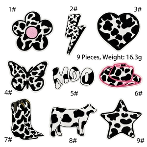 9-piece set of black and white cow print embroidered patches featuring cute animal motifs