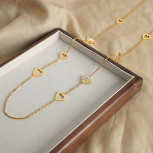 Elegant gold-plated titanium steel double-layer heart necklace with sparkling zircon crystals
