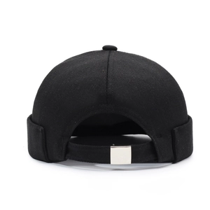 Retro black cotton brimless docker hat featuring a vintage mountain embroidery design