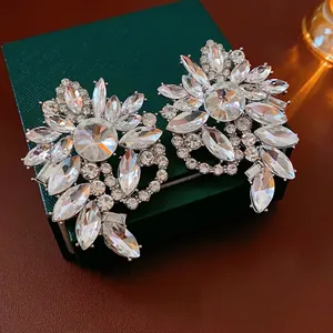 Luxury silver flower earrings with sparkling crystal marquis stones for evening wear